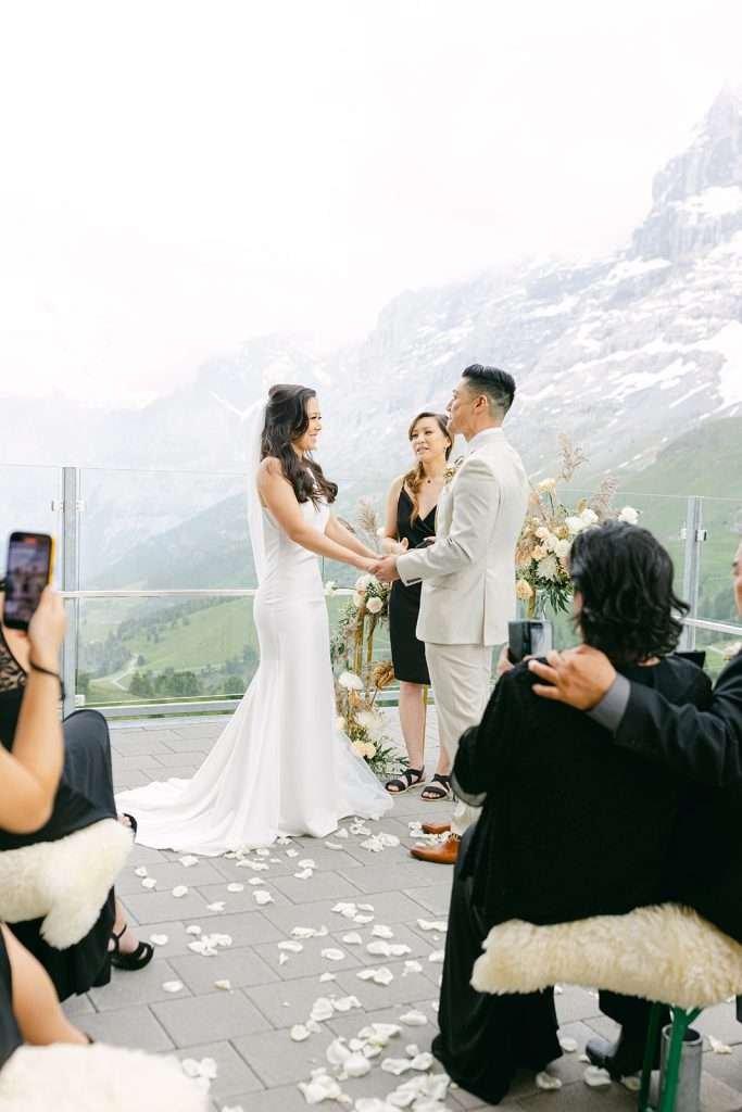 A married couple during their intimate wedding in Switzerland.