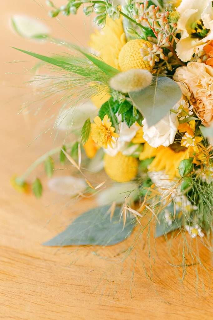the bouquet of a bride on a table.