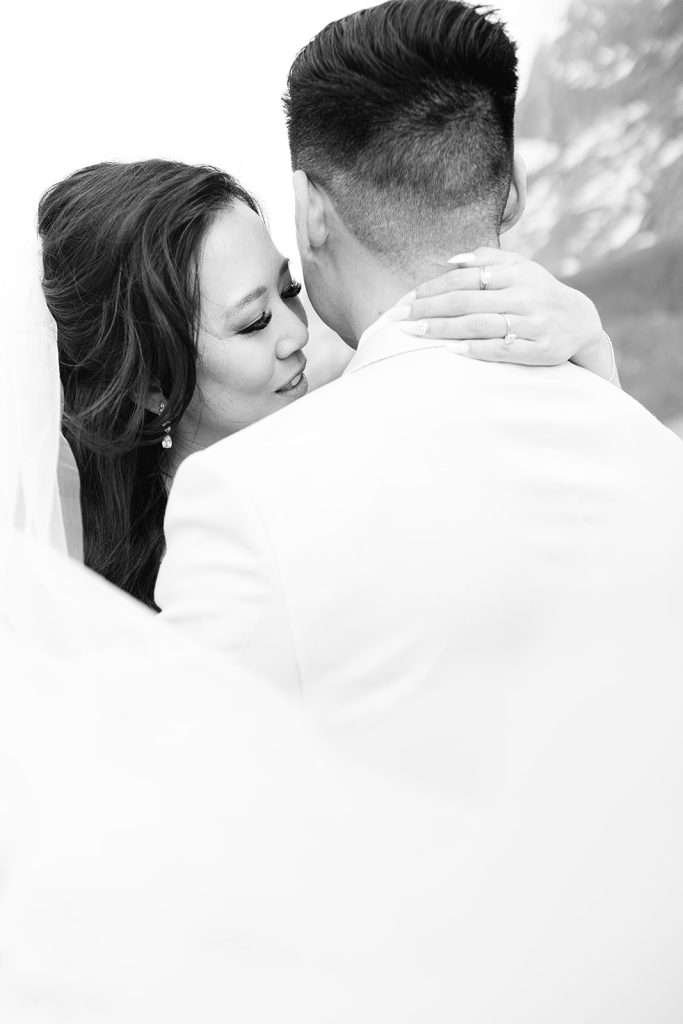 A couple kissing during their engagement shoot in Lauterbrunnen.