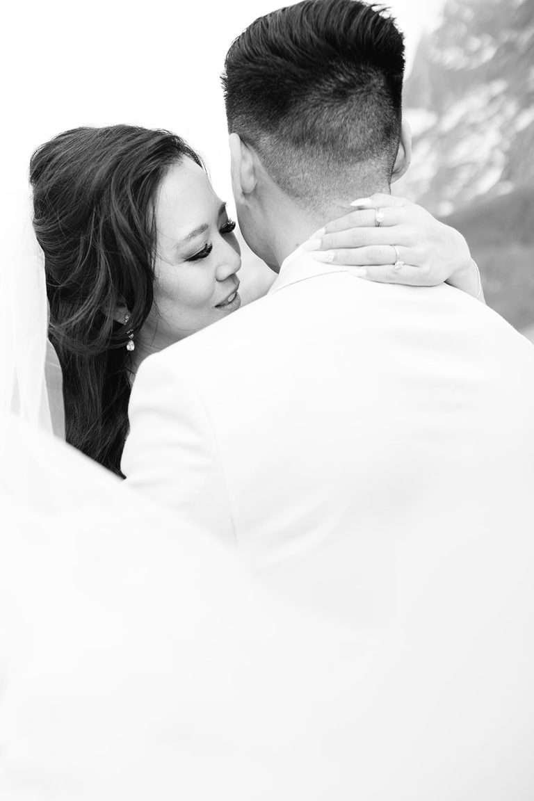 A couple kissing during their engagement shoot in Lauterbrunnen.