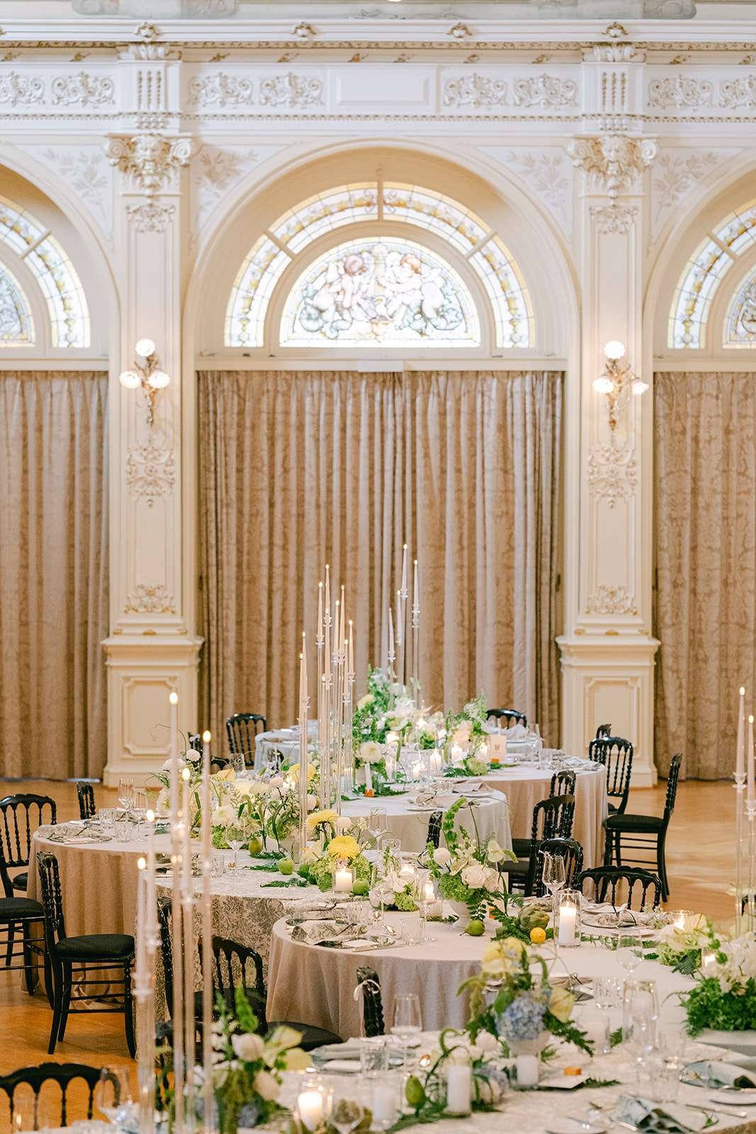 Details of an ornate receptions set up with winding round tables at a destination wedding in Switzerland